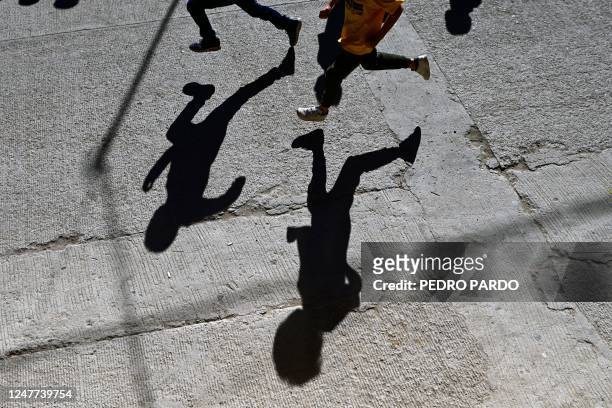 Boys compete in a short race during the first day of activities of the ultra marathon "Caballo Blanco" in Urique, Chihuahua state, Mexico, on March...