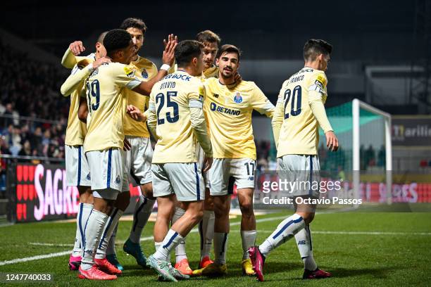 Danny Namaso of FC Porto celebrates with teammates after scoring te team's first goal during the Liga Portugal Bwin match between GD Chaves and FC...