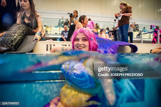 Chobo a disabled person who is dressed as a mermaid, takes part in the group swim during the MerMagic Convention at the Freedom Aquatic & Fitness...