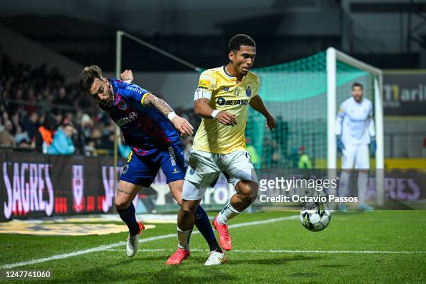Joao Mendes of GD Chaves and Danny Namaso of FC Porto in action during the Liga Portugal Bwin match between GD Chaves and FC Porto at Estadio...