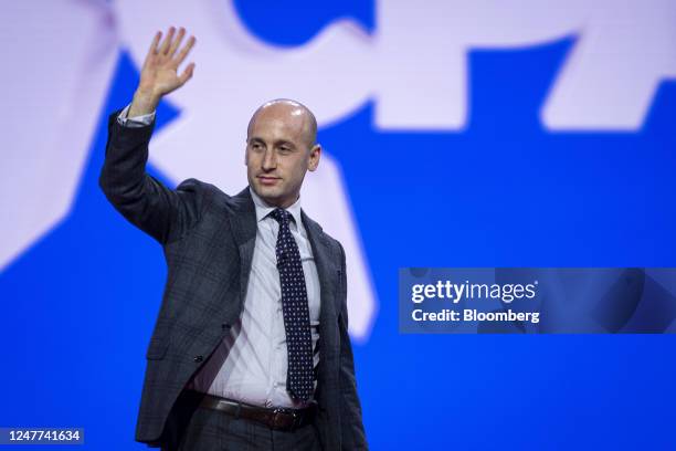 Stephen Miller, former White House senior advisor for policy, waves during the Conservative Political Action Conference in National Harbor, Maryland,...