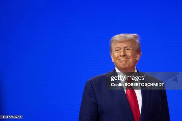 Former US President and 2024 presidential hopeful Donald Trump arrives to speak during the 2023 Conservative Political Action Coalition Conference in...