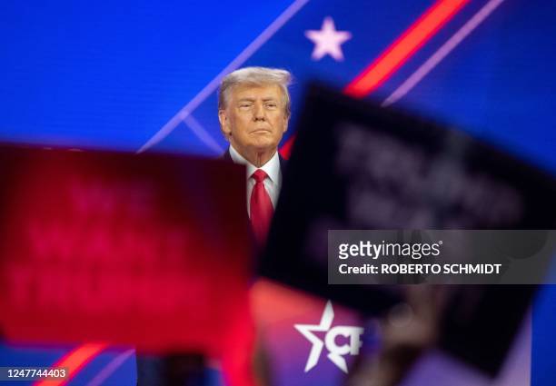 Former US President and 2024 presidential hopeful Donald Trump arrives to speak during the 2023 Conservative Political Action Coalition Conference in...