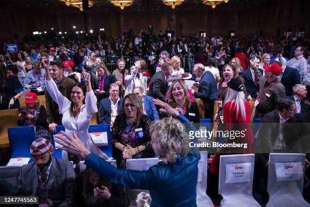 Attendees cheer prior to former US President Donald Trump, not pictured, arriving during the Conservative Political Action Conference in National...