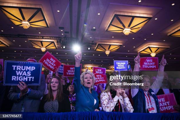 Attendees cheer as former US President Donald Trump, not pictured, speaks during the Conservative Political Action Conference in National Harbor,...