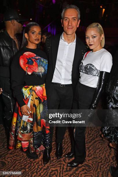 Ramla Ali, Gianfilippo Testa and Pom Klementieff attend the afterparty for the Alexander McQueen AW23 show during Paris Fashion Week on March 4, 2023...