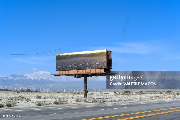 Billboard displays a photo by Tyre Nichols during the media preview day of the Desert X exhibit, in the Coachella Valley near near Desert Hot...