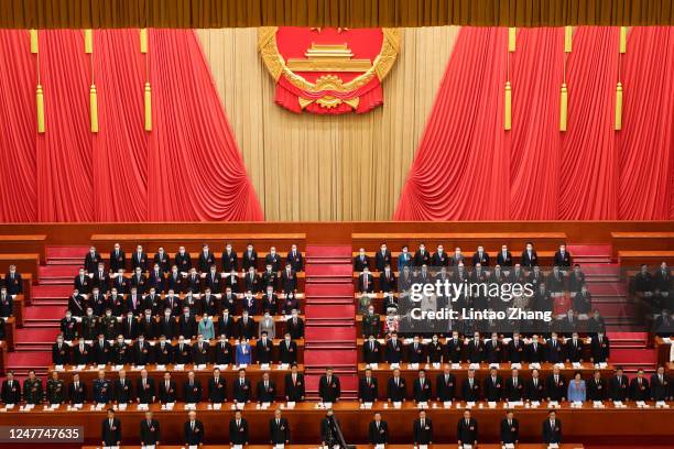 Chinese President Xi Jinping attend the opening of the first session of the 14th National People's Congress at The Great Hall of People on March 5,...