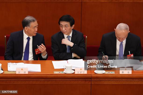 Delegates Wang Yang, Wang Huning, Cai Qi attend the opening of the first session of the 14th National People's Congress at The Great Hall of People...