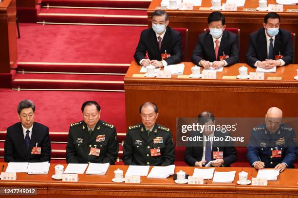 Delegates Chen Wenqing, Zhang Youxia, He Weidong, Li Shulei and Xu qiliang attend the opening of the first session of the 14th National People's...