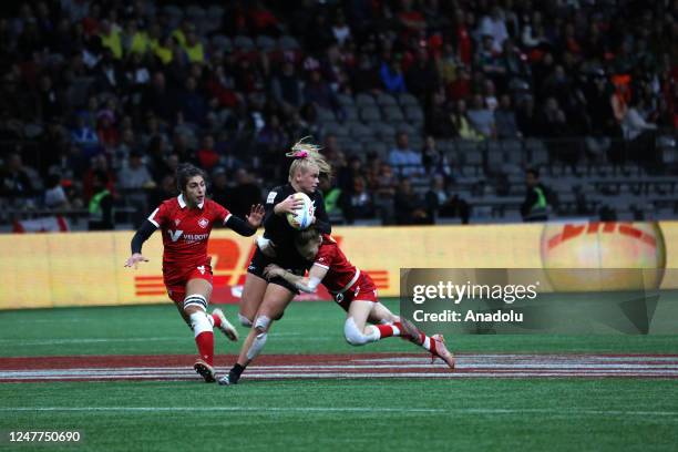 Players in action during the World Rugby Women's Sevens Series match between Canada and New Zealand at BC Place Stadium in Vancouver, British...