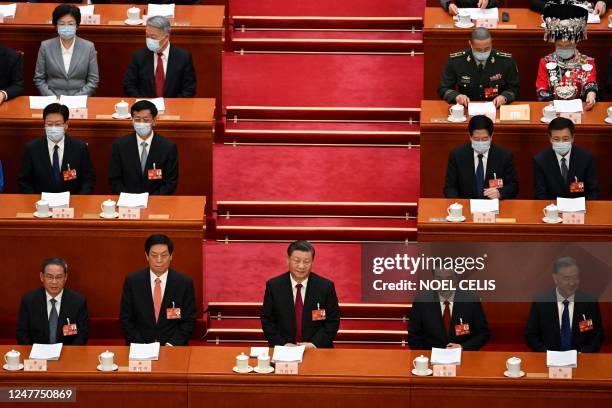 China's Politburo Standing Committee member Li Qiang, National People's Congress Chairman Li Zhanshu, China's President Xi Jinping, Premier Li...