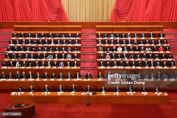 Chinese President Xi Jinping attends the opening of the first session of the 14th National People's Congress at The Great Hall of People on March 5,...
