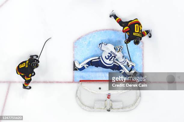 Elias Pettersson of the Vancouver Canucks scores a goal on Matt Murray of the Toronto Maple Leafs during the third period of their NHL game at Rogers...