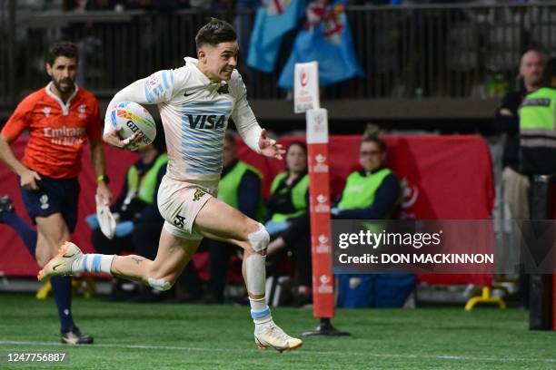 Argentina's Marcos Moneta sprints to a score a try against Fiji during the annual HSBC Canada Rugby Sevens tournament at BC Place in Vancouver,...