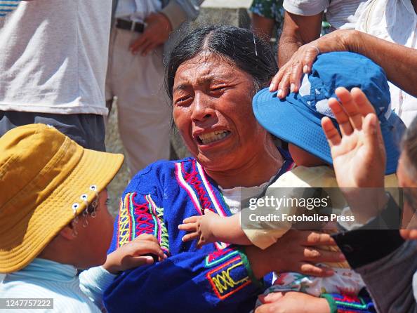 Crying Native A woman crying when a group of indigenous women carry out a healing ...