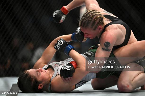 Kyrgyzstan's mixed martial arts fighter Valentina Shevchenko fights Mexico's mixed martial arts fighter Alexa Grasso during their UFC 285 women's...