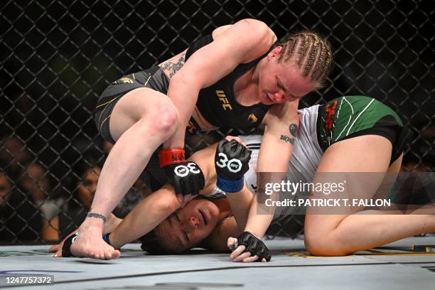 Kyrgyzstan's mixed martial arts fighter Valentina Shevchenko fights Mexico's mixed martial arts fighter Alexa Grasso during their UFC 285 women's...