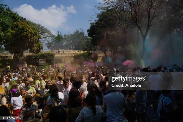 Salvadorans and members of the India community in El Salvador, participate in the celebration of the traditional Hindu Holi Festival in a park in the...