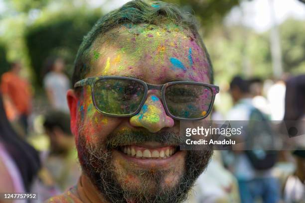 Salvadorans and members of the India community in El Salvador, participate in the celebration of the traditional Hindu Holi Festival in a park in the...