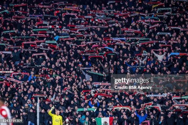 Fans of Feyenoord celebrate the win during the Dutch Eredivisie match between Feyenoord and FC Groningen at Stadion Feijenoord on March 4, 2023 in...