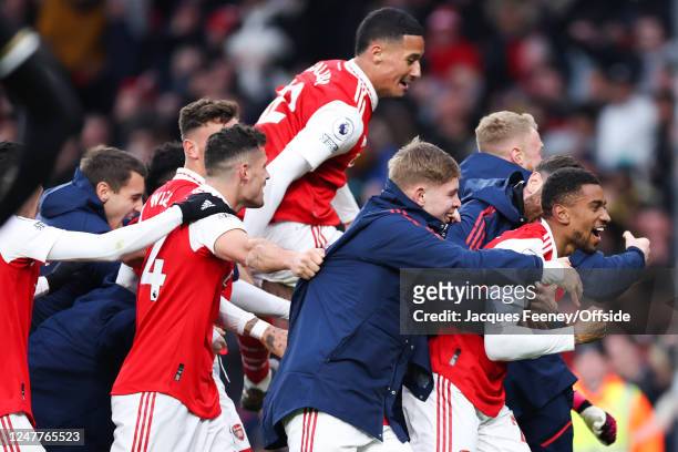 Reiss Nelson of Arsenal celebrates their third goal with his team mates during the Premier League match between Arsenal FC and AFC Bournemouth at...