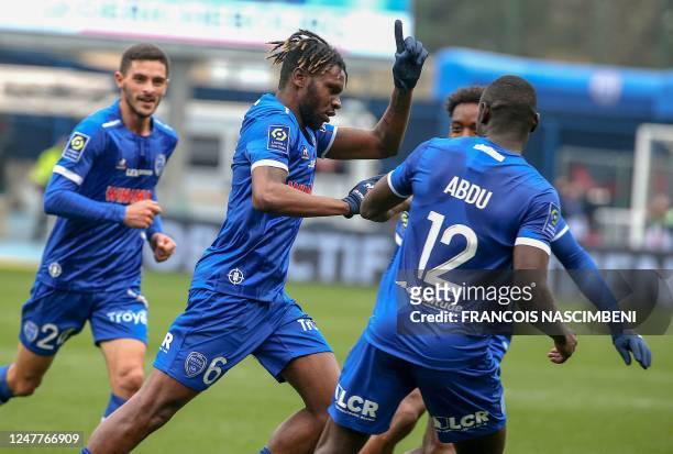 Troyes' midfielder Rominigue Kouamé celebrates after scoring a goal during the French L1 football match between ES Troyes AC and AS Monaco at Stade...
