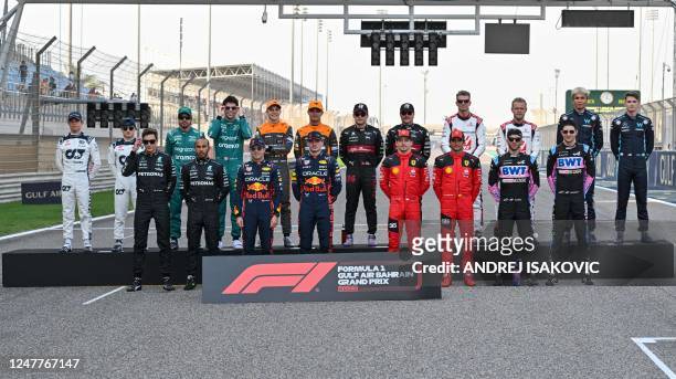 Mercedes' British drivers George Russell and Lewis Hamilton, Red Bull Racing's Mexican driver Sergio Perez and Dutch driver Max Verstappen, Ferrari's...