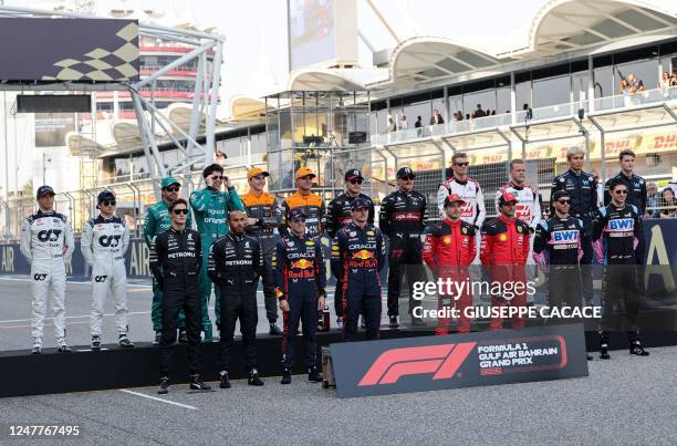 Mercedes' British drivers George Russell and Lewis Hamilton, Red Bull Racing's Mexican driver Sergio Perez and Dutch driver Max Verstappen, Ferrari's...