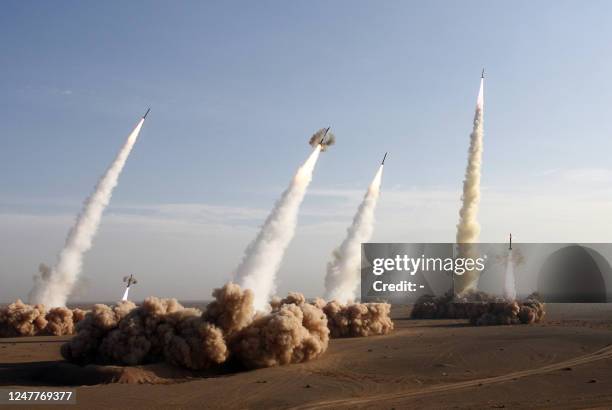 Iran's Revolutionary Guards fire test missiles during the first phase of military manoeuvres in the central desert outside the holy city of Qom, 02...