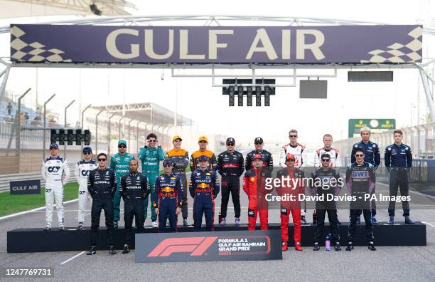 The drivers line up for a group photo before the Bahrain Grand Prix at the Bahrain International Circuit, Sakhir. Picture date: Sunday March 5, 2023.