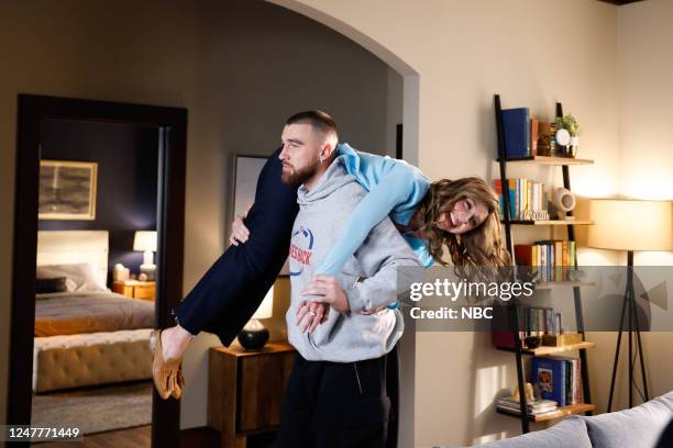 Travis Kelce, Kelsea Ballerini Episode 1840 -- Pictured: Host Travis Kelce and Heidi Gardner during the NFL Gives Back sketch on Saturday, March 4,...