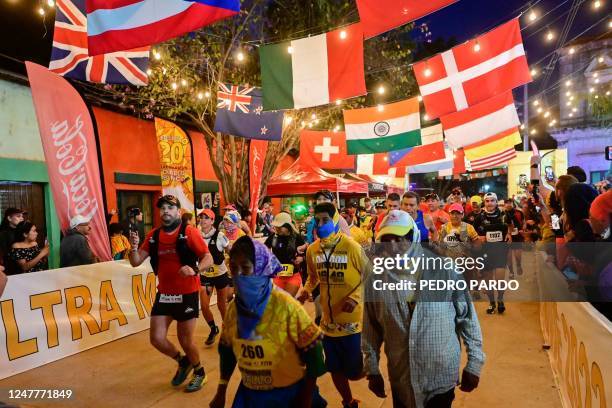 Athletes and long-distance runners of the Raramuri community compete in the ultramarathon "Caballo Blanco" in Urique, Chihuahua State, Mexico, on...