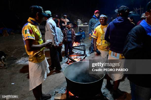 Long-distance runners of the Raramuri community get ready to compete in the ultramarathon "Caballo Blanco" in Urique, Chihuahua State, Mexico, on...