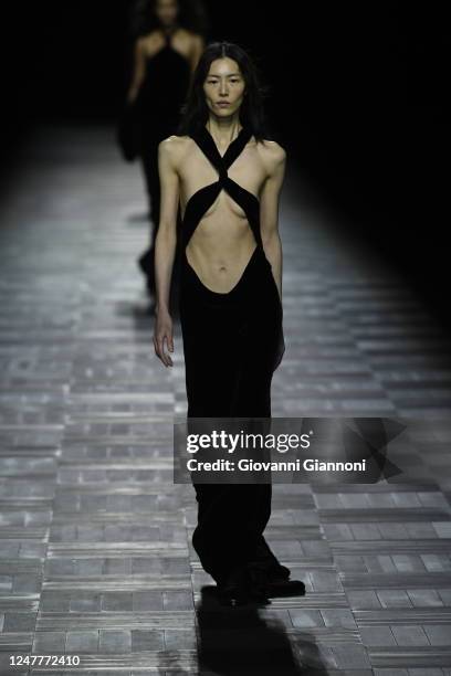 Model on the runway at Ann Demeulemeester Fall 2023 Ready To Wear Fashion Show on March 4, 2023 in Paris, France.
