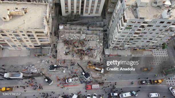 An aerial view of rescue teams working on six-storey building collapsed in Turkiye's southeastern province of Sanliurfa on Sunday, March 5, 2023. The...