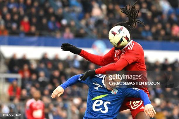 Brest's Honduran forward Alberth Elis fights for the ball with Strasbourg's French forward Kevin Gameiro during the French L1 football match between...
