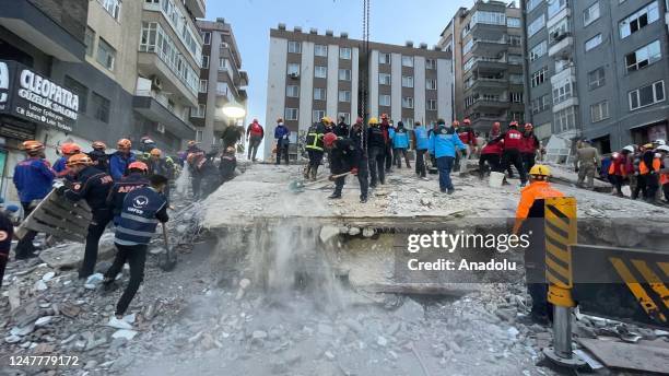 Search and rescue teams work on six-storey building collapsed in Turkiye's southeastern province of Sanliurfa on Sunday, March 5, 2023. The building...
