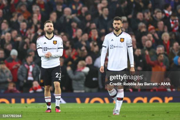 Dejected Luke Shaw and Bruno Fernandes of Manchester United after Liverpool scored a goal to make it 2-0 during the Premier League match between...