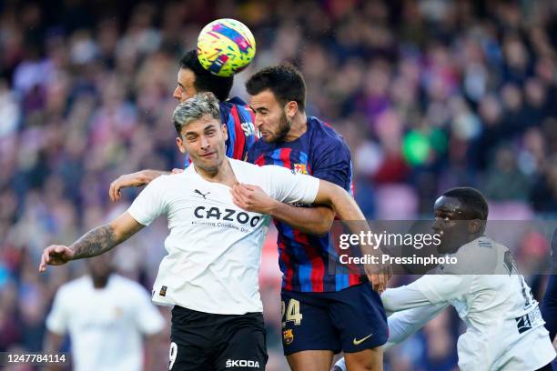 Eric Garcia of FC Barcelona and Hugo Duro of Valencia CF during the La Liga match between FC Barcelona and Valencia CF played at Spotify Camp Nou...