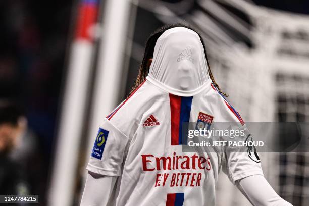 Lyon's French forward Bradley Barcola reacts during the French L1 football match between Olympique Lyonnais and FC Lorient at the Groupama Stadium in...