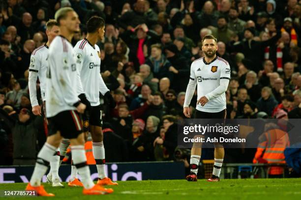 Luke Shaw of Manchester United looks on during the Premier League match between Liverpool FC and Manchester United at Anfield on March 5, 2023 in...