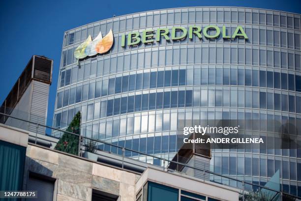 Picture taken on March 5, 2023 shows the Iberdrola logo on Iberdrola energy company's headquarters building in the northern Spanish Basque city of...