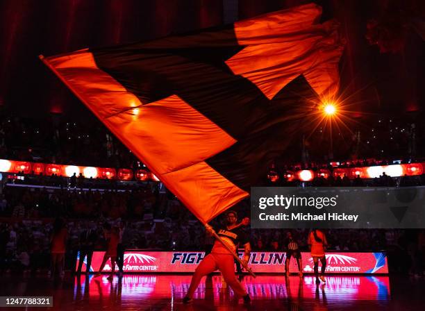 An Illinois Fighting Illini cheerleader is seen during the game against the Michigan Wolverines at State Farm Center on March 2, 2023 in Champaign,...