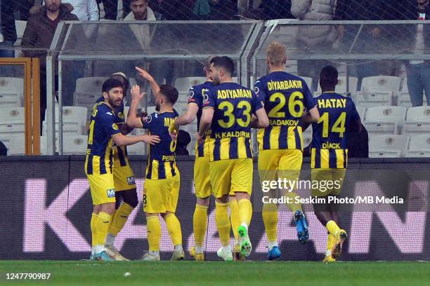 Ali Sowe of MKE Ankaragucu celebrates after scoring the first goal of his team with teammates during the Super Lig match between Besiktas and MKE...