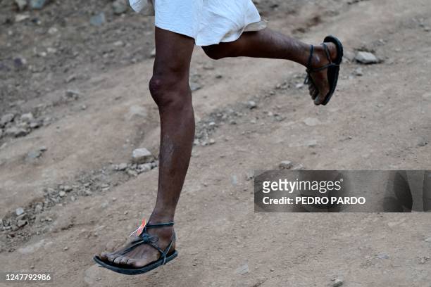 Raramuri man competes in the ultramarathon "Caballo Blanco" in the Tarahumara mountains in Urique, Chihuahua State, Mexico, on March 5, 2023. -...