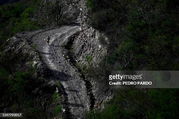 Man competes in the ultramarathon "Caballo Blanco" in the Tarahumara mountains in Urique, Chihuahua State, Mexico, on March 5, 2023. - Hundreds of...