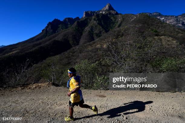 Raramuri man competes in the ultramarathon "Caballo Blanco" in the Tarahumara mountains in Urique, Chihuahua State, Mexico, on March 5, 2023. -...