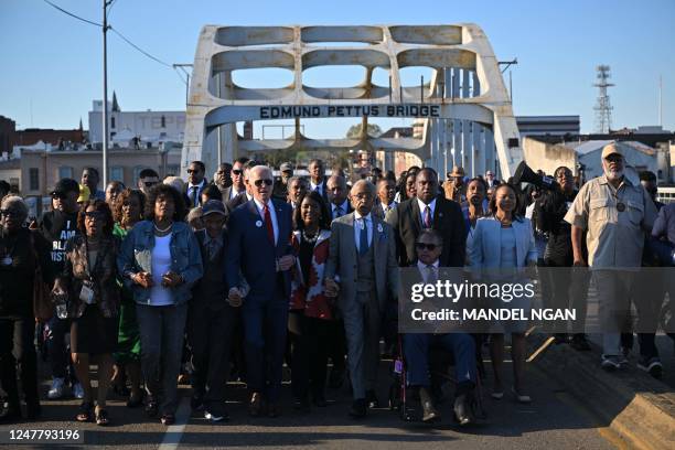 President Joe Biden, joined by US Representative Terri Sewell , Reverend Al Sharpton, Reverend Jesse Jackson, Martin Luther King III, and fellow...