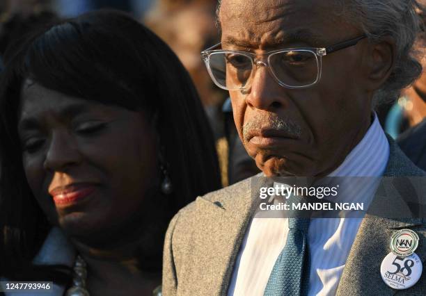 Reverend Al Sharpton participates in a prayer after crossing the Edmund Pettus Bridge in Selma, Alabama, on March 5 to mark the 58th anniversary of...